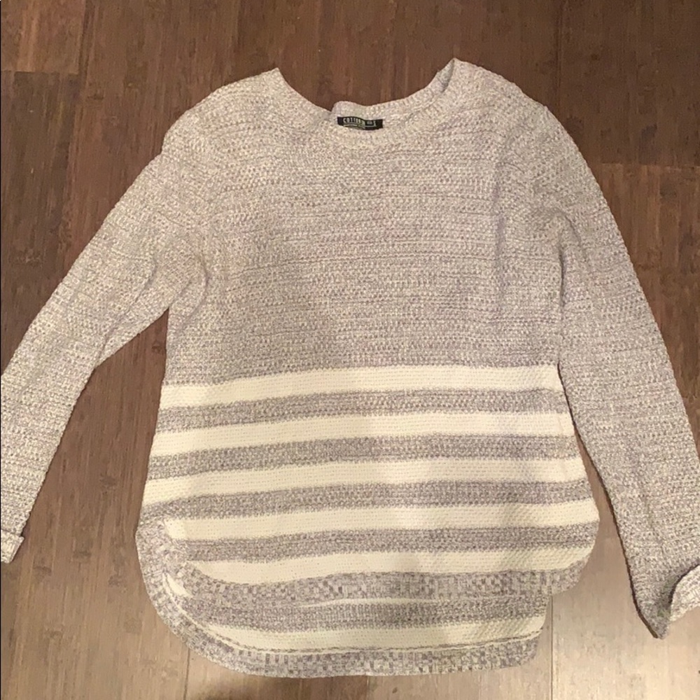 Gray and white sweater
